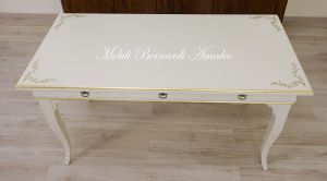 Classic style desk with colored lacquered finish with gold leaf decorations and frames